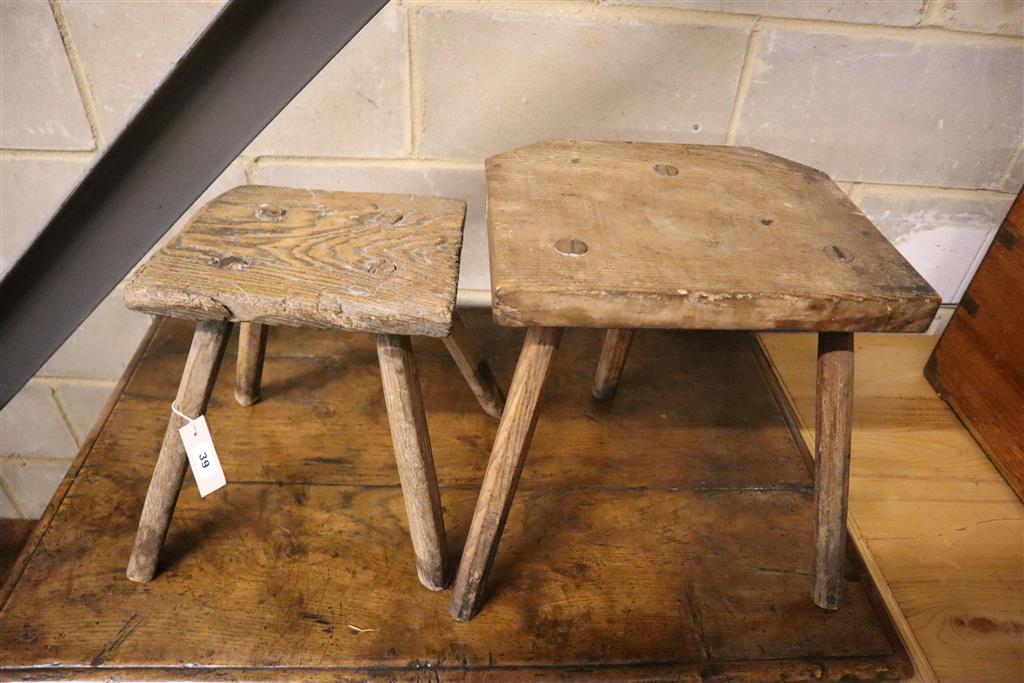 Two oak and elm primitive stools, larger 39cm high